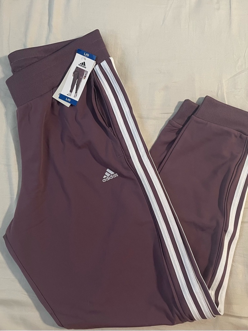 Adidas Women's Purple Track Pants with White Side Stripes